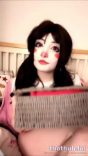 Ryn @rynkerbelle with clown makeup shows off her toy collection