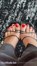 Corinna Kopf Feet red toenails